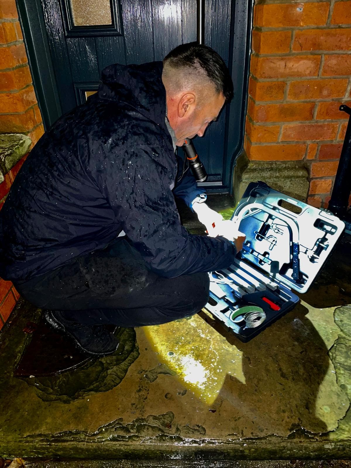 Professional locksmith at work in Burnley